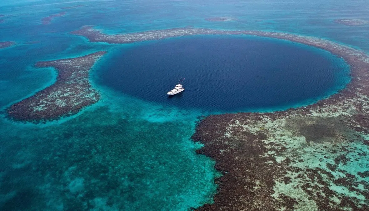 Aerial view of boat arriving at Las Terrazas Resort dock
